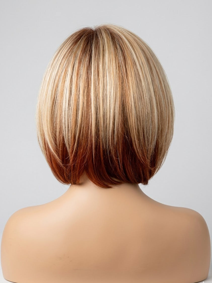 Back view of a person with a styled haircut on a neutral background