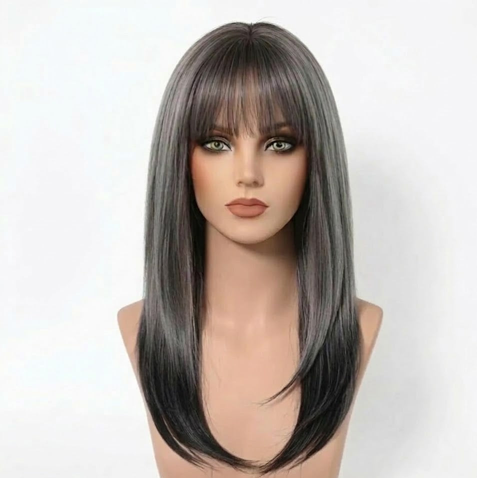 Mannequin head with a gray wig on a white background